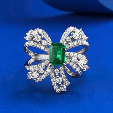 Emerald Grace Bow Ring – S925 Silver with Simulated Emerald and Pavé H