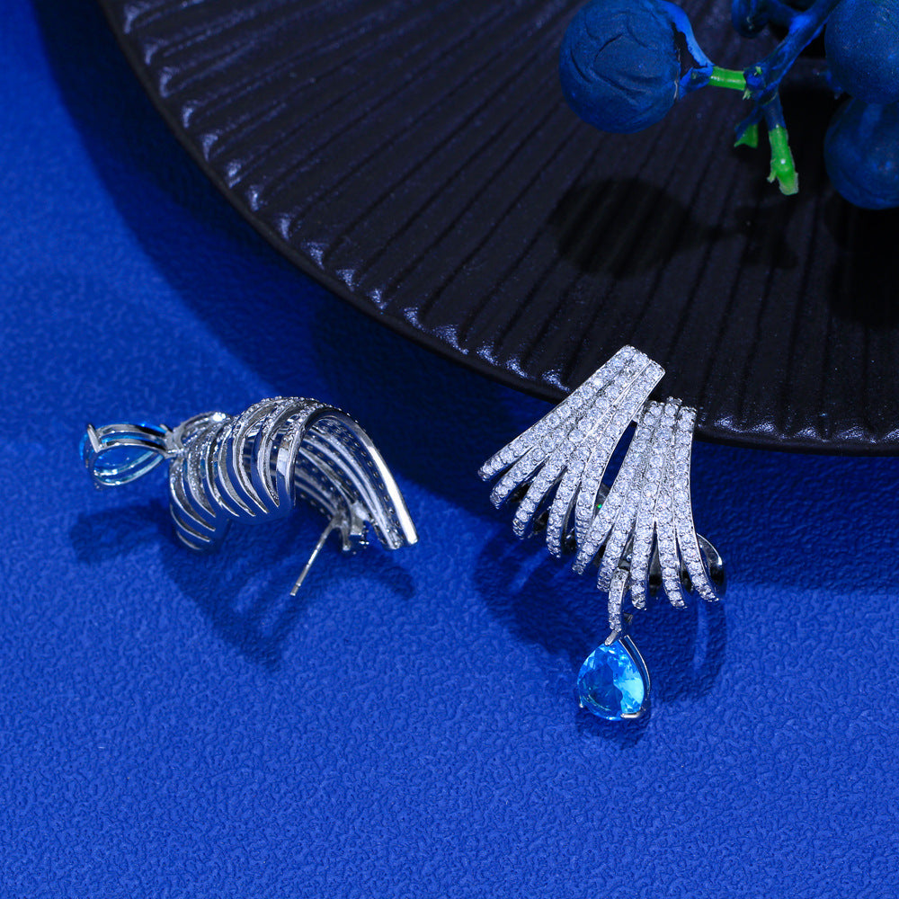 Celene Orbit Earrings – S925 Silver Posts & Sculpted Halo Design