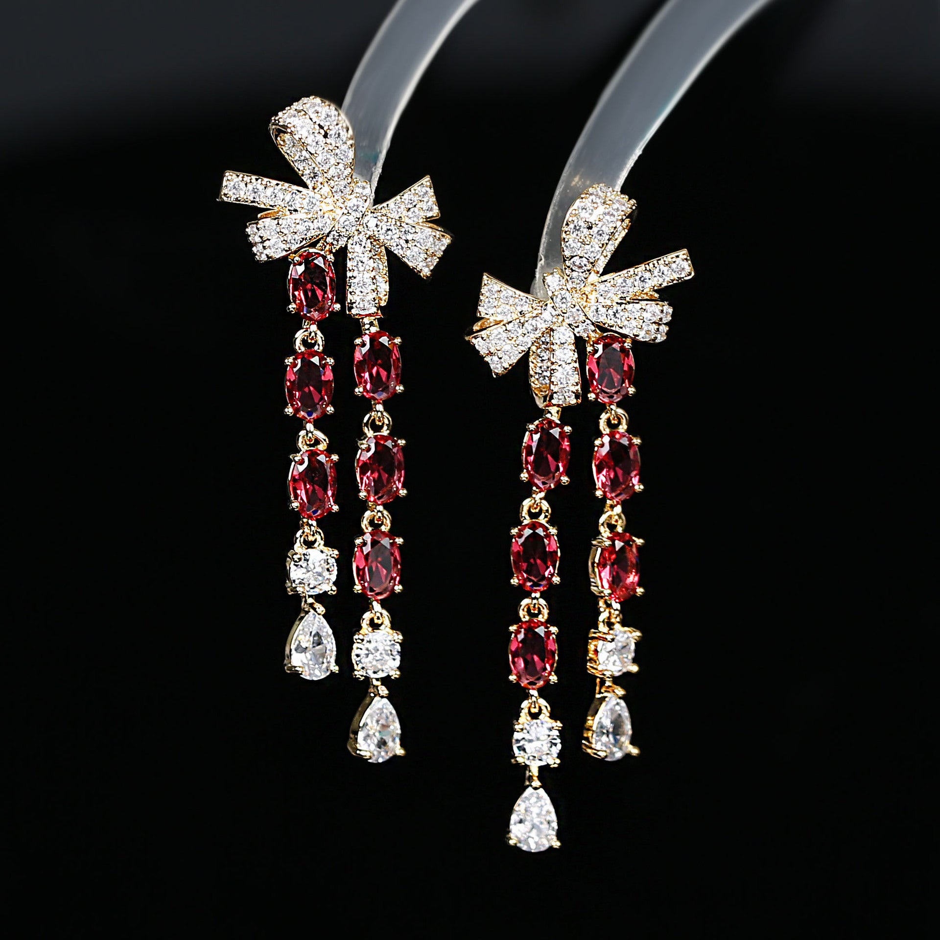 Velvet Charm Earrings – Bow & Tassel Glam in Vibrant Zircon