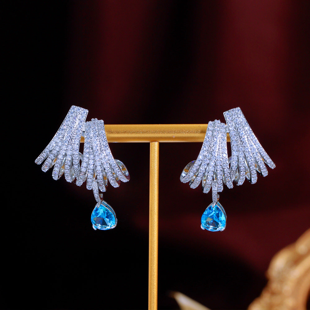Celene Orbit Earrings – S925 Silver Posts & Sculpted Halo Design