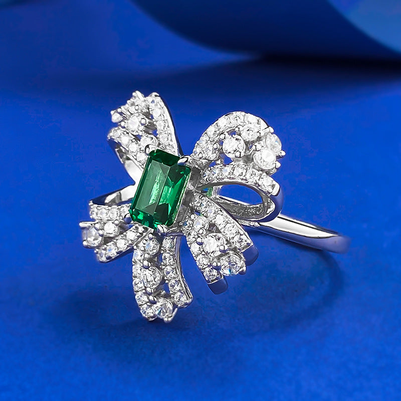 Emerald Grace Bow Ring – S925 Silver with Simulated Emerald and Pavé H