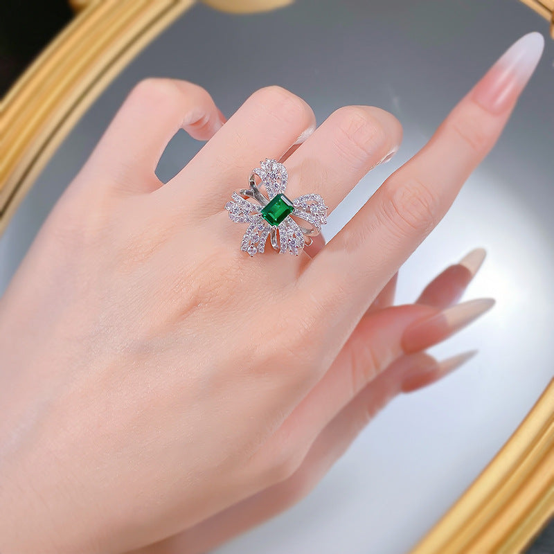 Emerald Grace Bow Ring – S925 Silver with Simulated Emerald and Pavé H