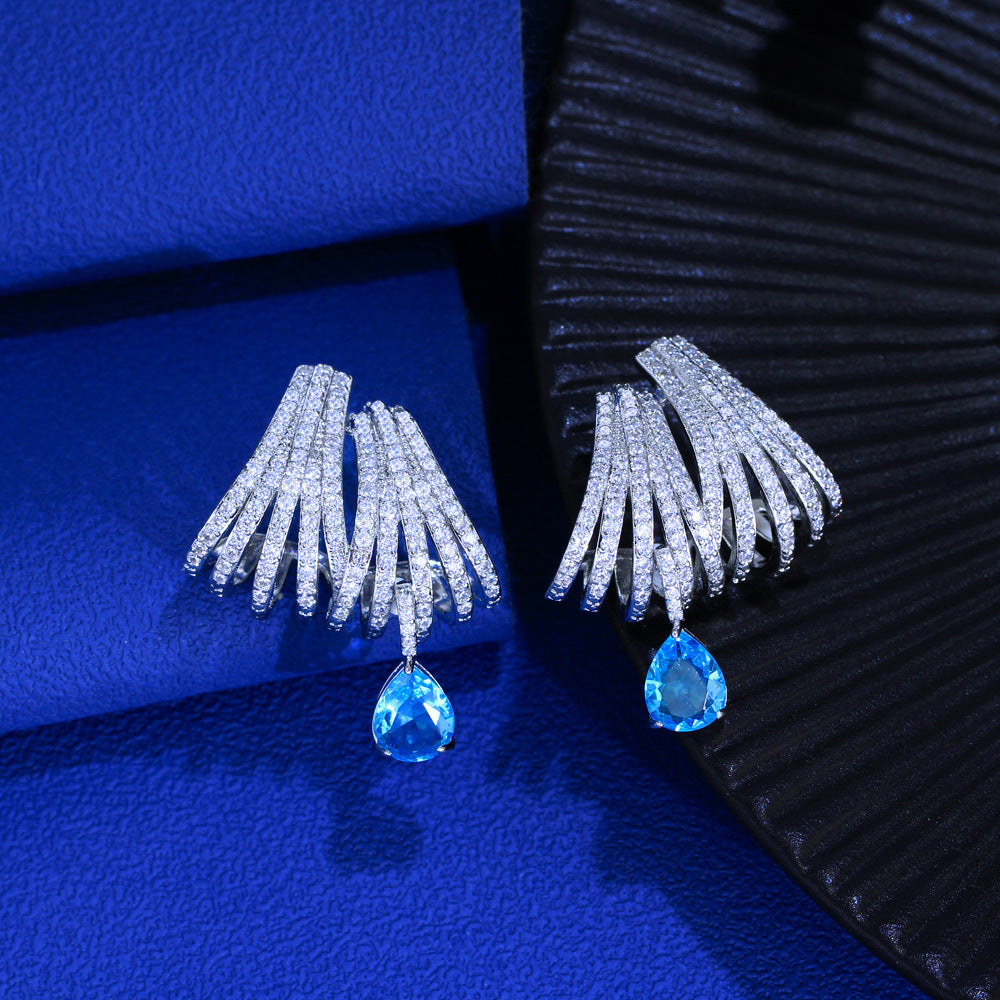 Celene Orbit Earrings – S925 Silver Posts & Sculpted Halo Design