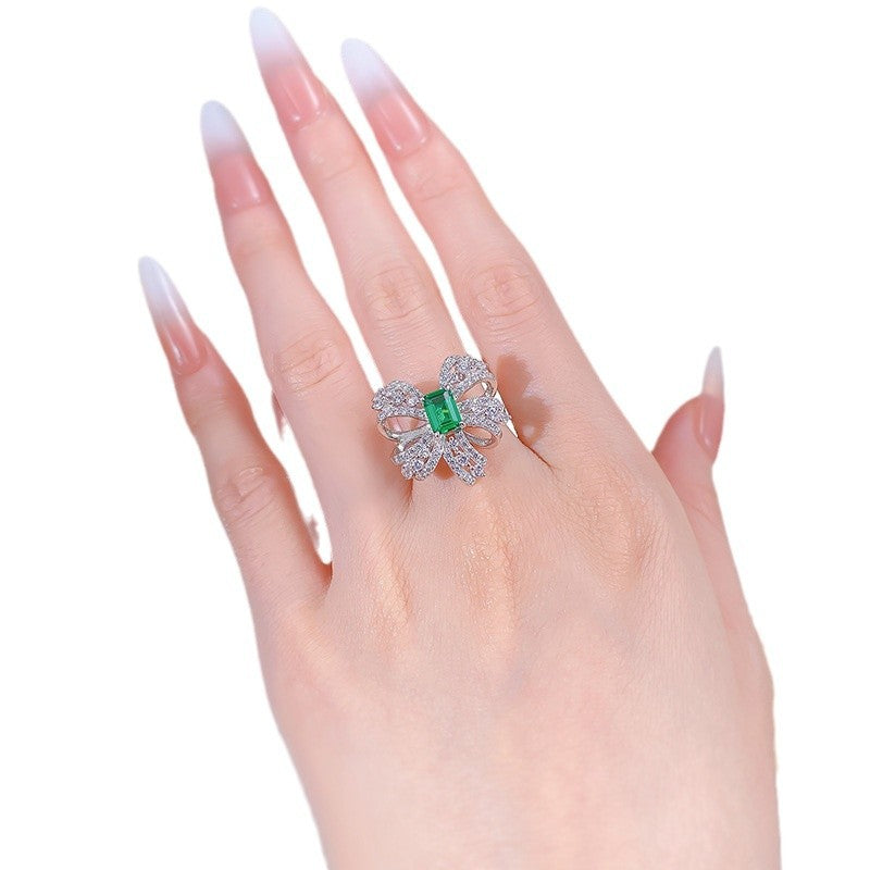Emerald Grace Bow Ring – S925 Silver with Simulated Emerald and Pavé H